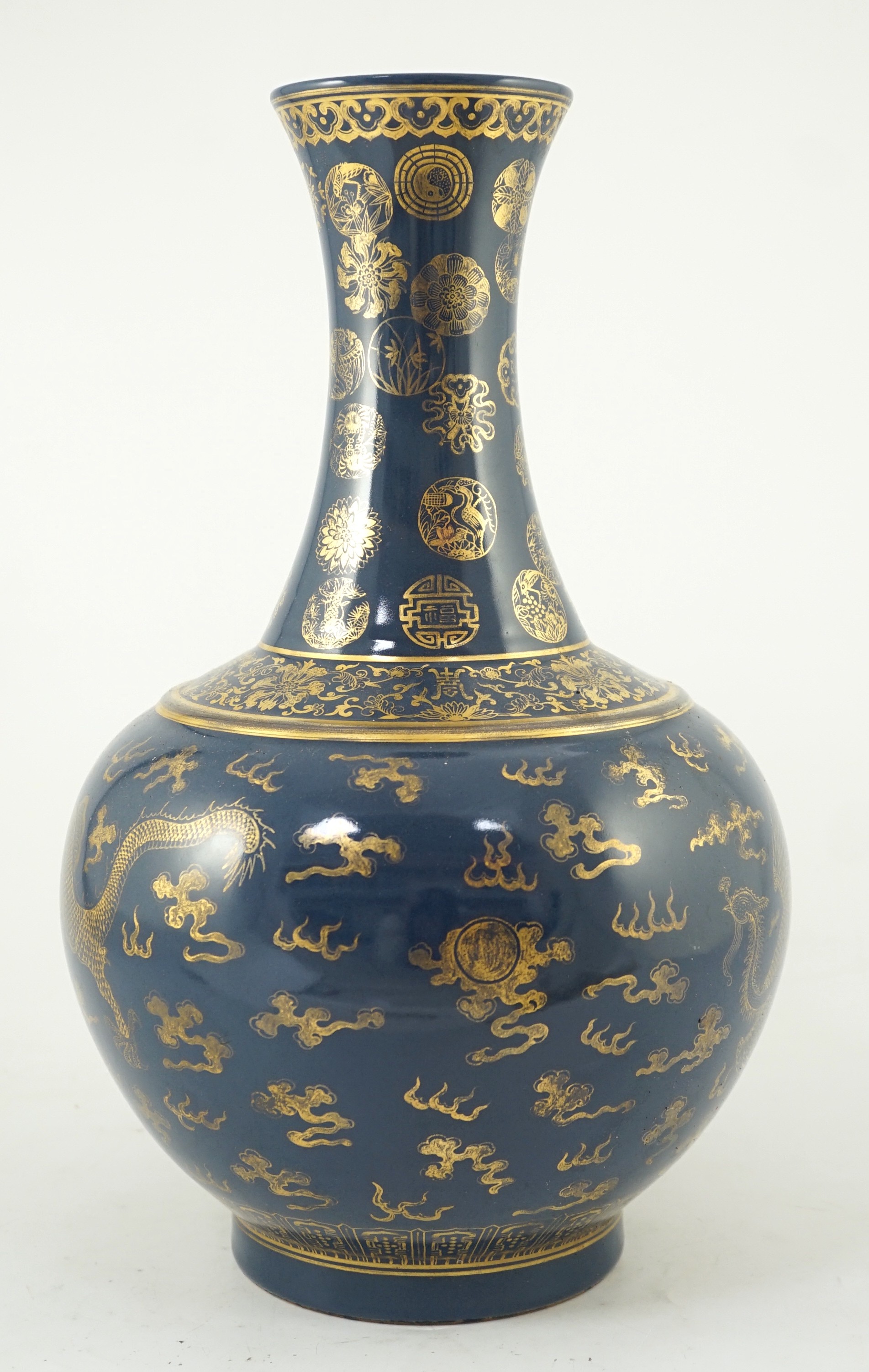 A Chinese gilt decorated blue ground ‘dragon’ vase, Guangxu mark but later, 38.5cm high, wear to gilding